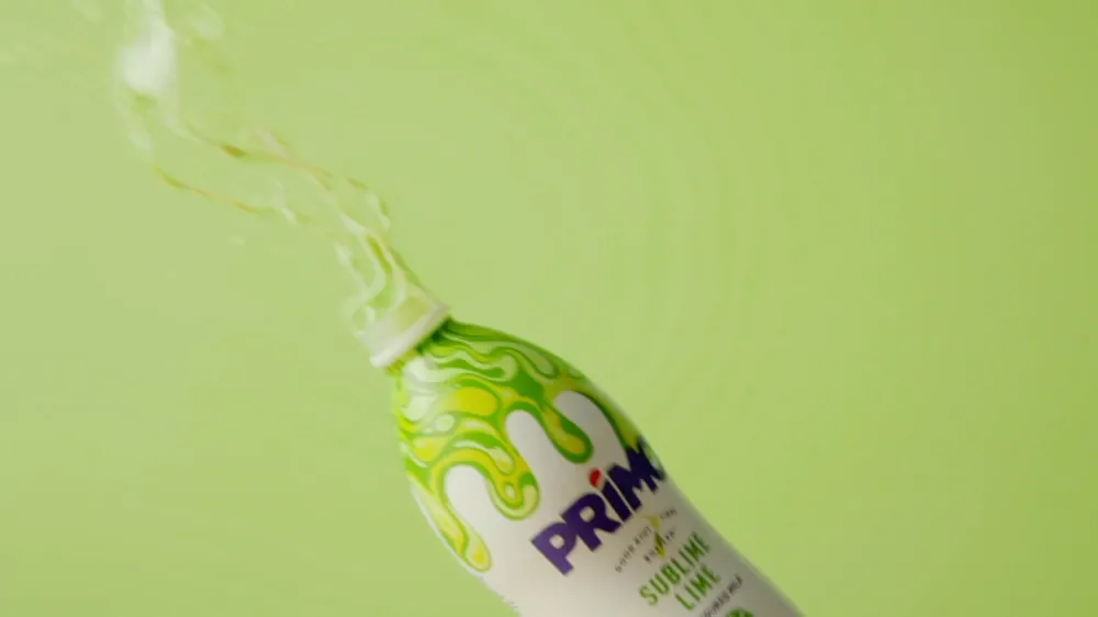 Lime Primo bottle pouring on green