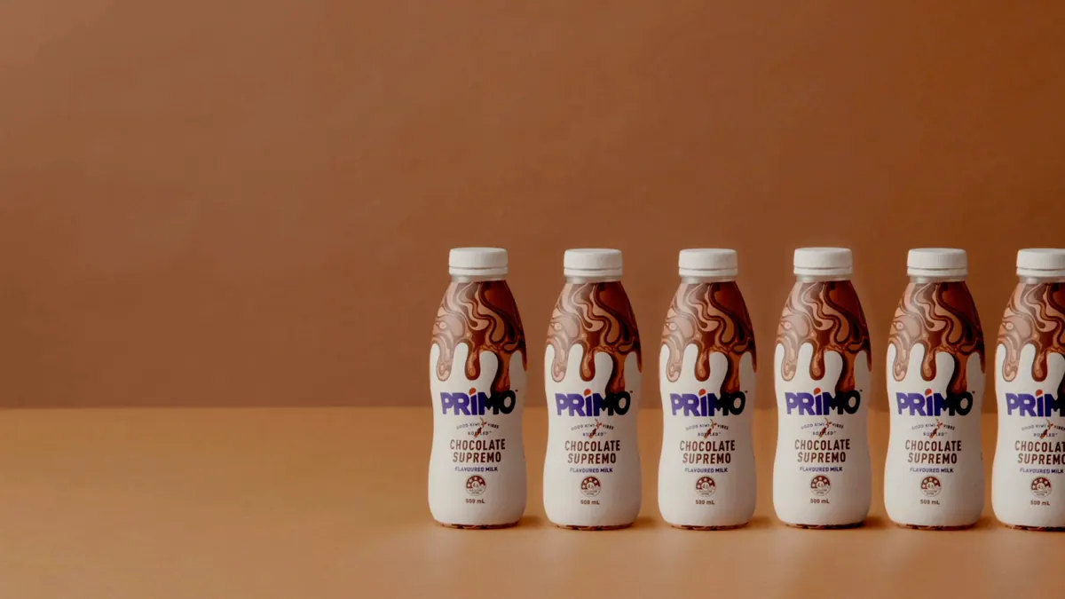 Row of chocolate Primo bottles