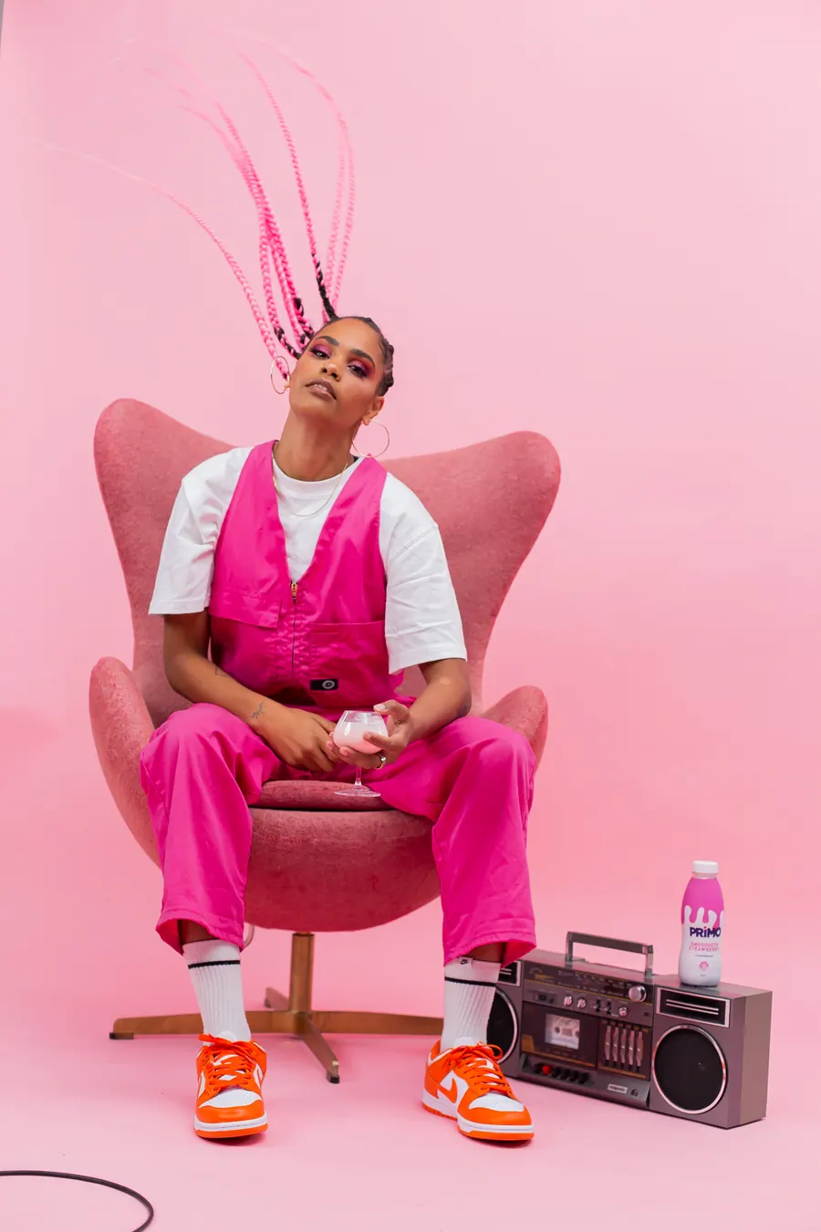 Jess B seated, hair flying